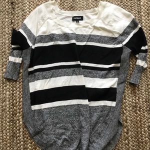Round hem sweater